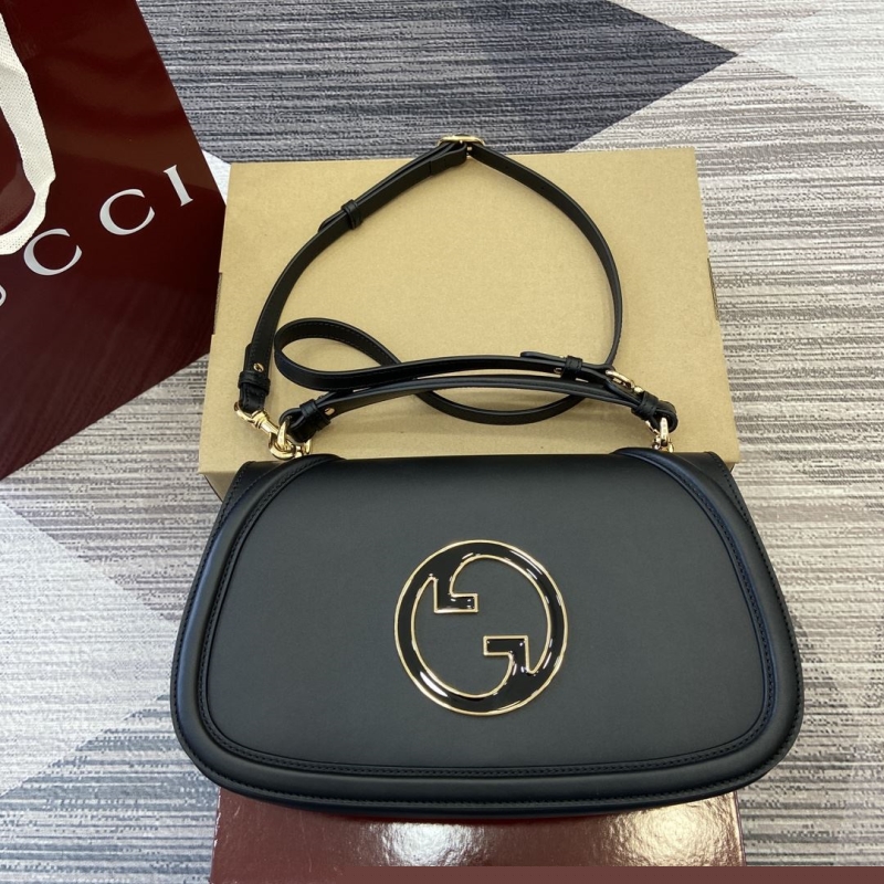 G*u*i top handle bags